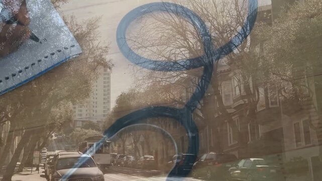 Vertical video: Following blue cord, male hand tracing loops in spiral pad on avenue with black pen