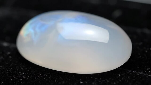 Iridescent Cabochon Gemstone Displaying Light and Texture