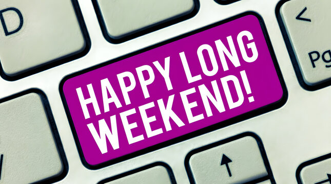 Happy long weekend message on keyboard button closeup