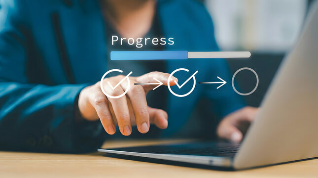 Professional hand interacting with virtual progress bar with completed steps over a modern laptop