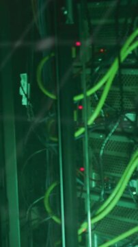 Vertical video: Glass rack showing green cables on overlay shift, CLI text scrolling to show status