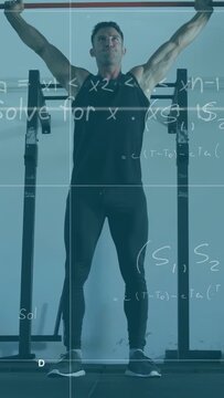 Vertical video: Stepping off rack, man in tank pressing red bar, squatting, gym training with graph