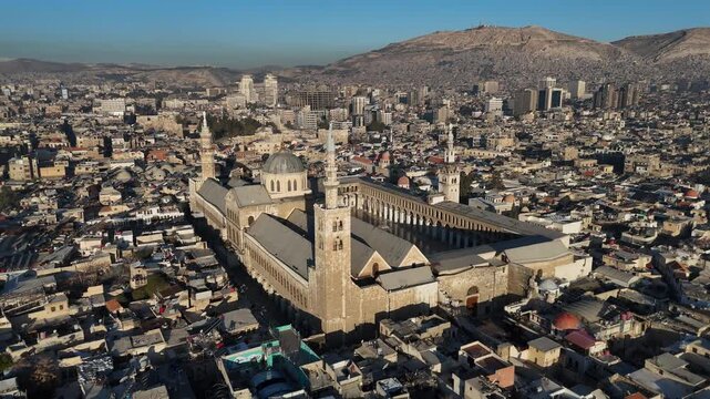 Cinematic high-angle perspective of one of the largest and oldest mosques in the world, Damascus, Syria Wide Aerial View of the Great Umayyad Mosque