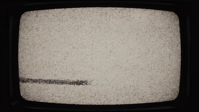A vintage television screen displays static, evoking a sense of nostalgia and technological obsolescence.