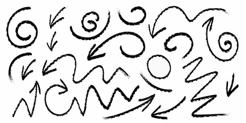 Obraz premium Collection of hand drawn black arrows and swirling shapes on white background