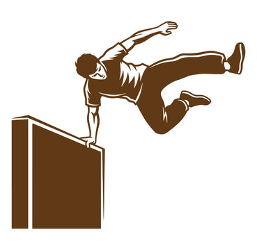 man jumping over a wall in a dynamic motion with arms outstretched