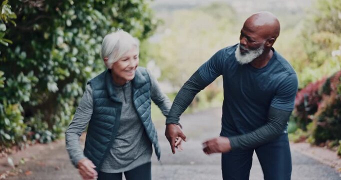 Senior, people and running with motivation for workout, exercise or outdoor training together. Interracial couple, elderly man and woman with encouragement for fitness endurance, stamina or support