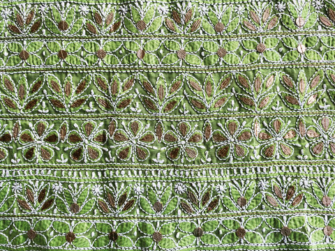 white thread Chikankari hand embroidery arranged in a multi-border design, enhanced with traditional Gotta Patti work.