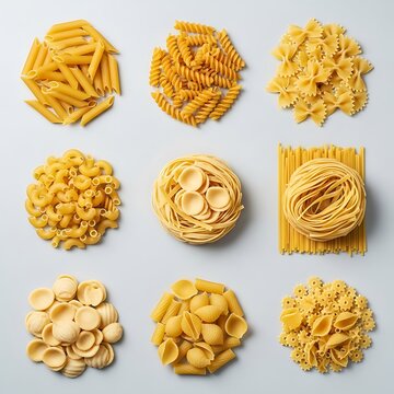 Variety of dry uncooked pasta shapes presented in aesthetic arrangement