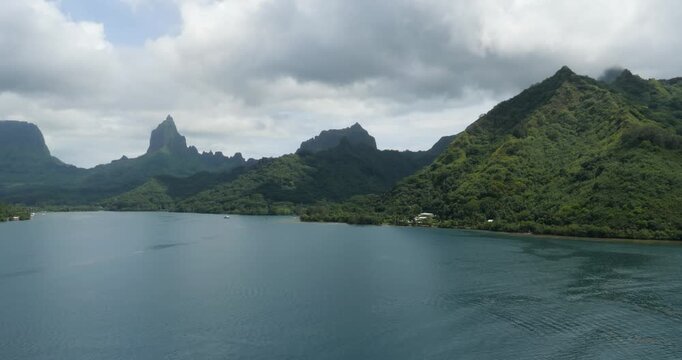 Panorama view of Opunohu Bay with mount Mouaroa, mount Rotui and mount Tohivea, island of Moorea, French Polynesia.