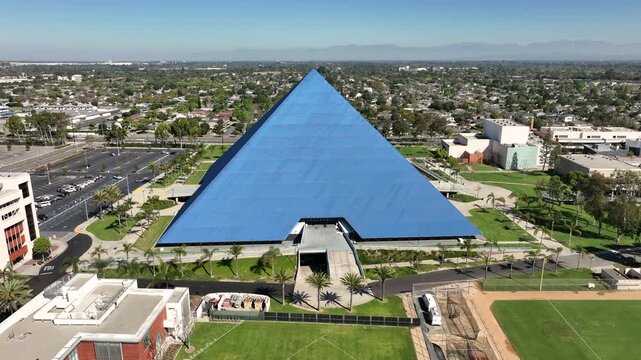 Aerial view of California State University, Long Beach featuring the iconic Walter Pyramid, also known as the Blue Pyramid, on a clear day in Long Beach, California.