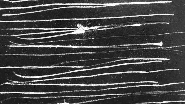 Abstract textured black background with shimmering white horizontal lines and subtle glitter