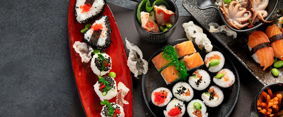 Various types of sushi including nigiri and rolls. Asian food concept. © bit24