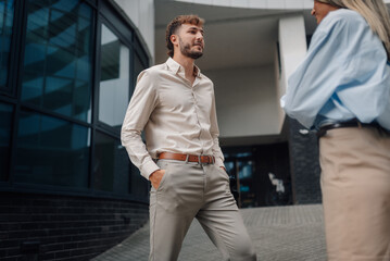 Fototapeta premium Business partners having conversation outside office building