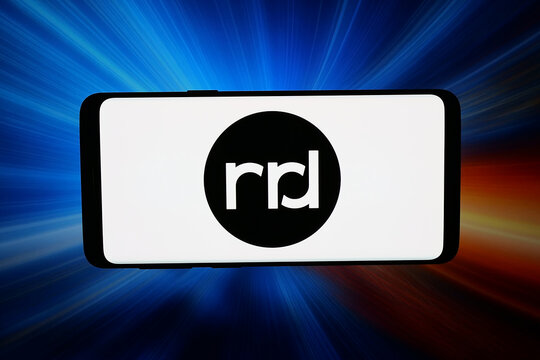 Stuttgart, Germany - 03-31-2026: In this photo illustration, the logo of business R.R. Donnelley Sons Company (RRD) is displayed on a smartphone in front of abstract background on computer screen.