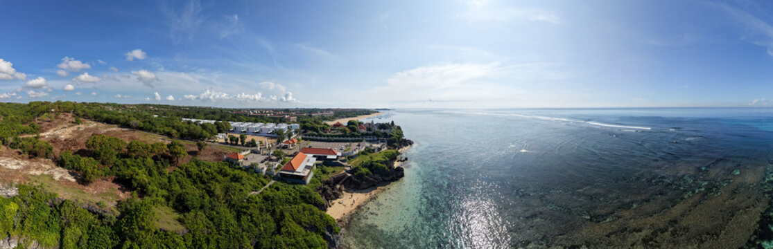Wide Panorama of Geger Beach and Nusa Dua Coastline with Tropical Ocean and Clear Sky