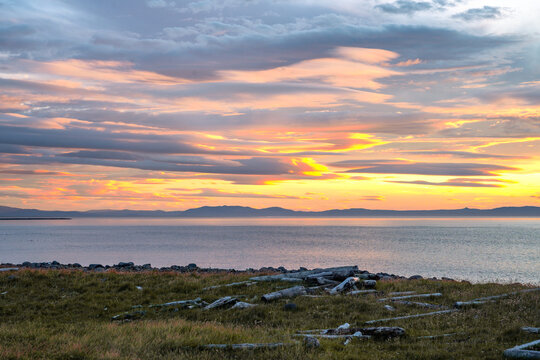 Sunrise with clouds on the coast of the Langanes peninsula in Iceland
