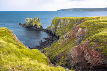Impressive coastal landscape with Ljósastapi rocks and Skjólfjörur beach with a view of the Atlantic Ocean near Vopnafjörður in North Iceland © Thilo Wagner