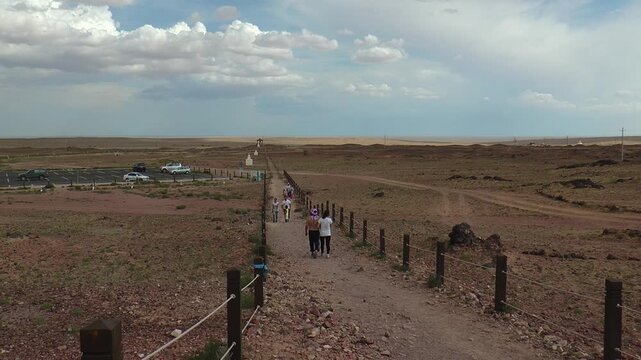 Buddhist architectural complex Shambala in the Gobi desert, Mongolia. Tourists come to Shambhala on a special track. Summer cloudy day.
