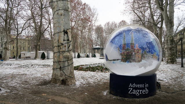 Zagreb, Croatia. Snowball winter scene in Zrinjevac park with the inscription Advent in Zagreb