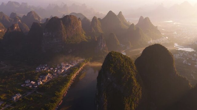 Idyllic Karst Mountain Landscape At Sunrise In Yangshuo County, China - Drone Shot
