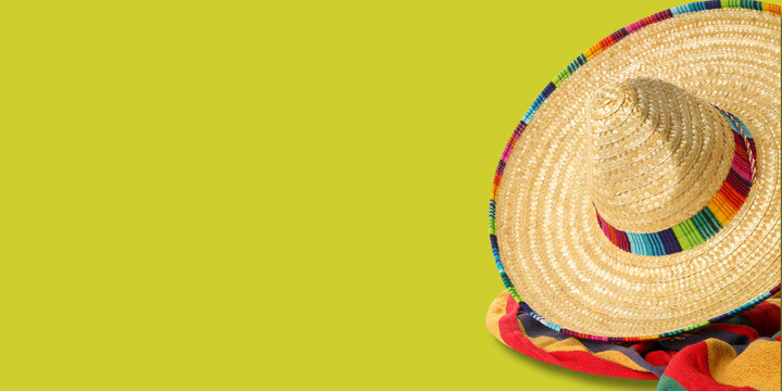 A sombrero rests on colorful fabric for Cinco de Mayo