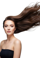 Fototapeta premium Young caucasian woman with voluminous, shiny dark brown hair flowing right, posing confidently in a medium shot against a clean transparent studio background. Concept for commercial beauty advertising