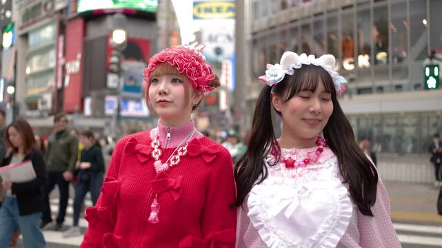 Two Young Women in Decora Fashion Standing at Shibuya Crossing