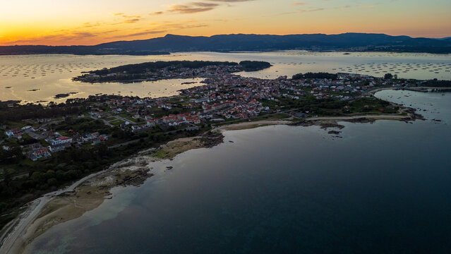 Aerial sunset view of A Illa de Arousa coastal town, Galicia