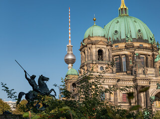 Berlin Cathedral and Fernsehturm with Saint George statue on Museum Island © Ekaterina