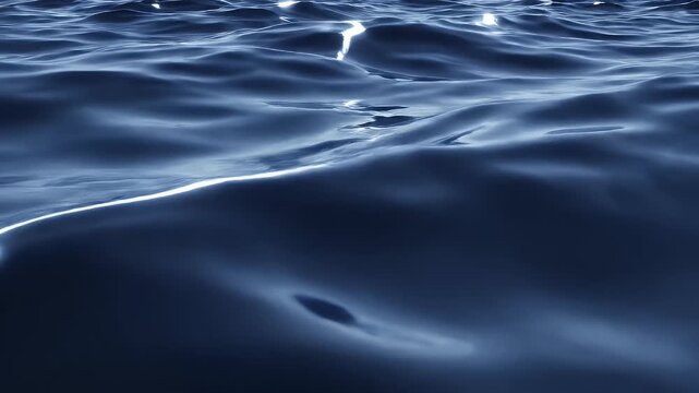 Close-up of Dark Blue Water Surface with Gentle Ripples and Reflections.