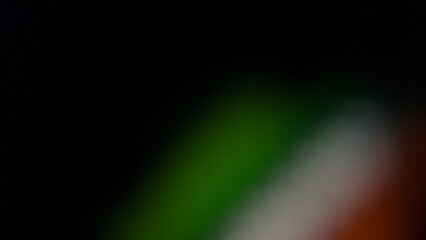 Obraz premium Dark Gradient Blur Background with Green and Warm Light Glow