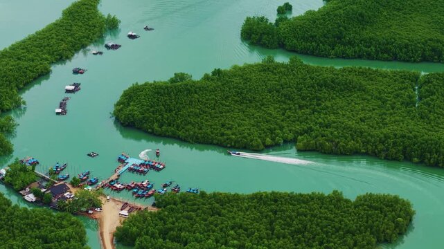 Aerial view Landscape of fish village in Phang Nga bay with fog. Hong green lush tropical island Thailand.