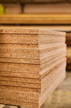 Chipboard panels stacked in a carpentry workshop