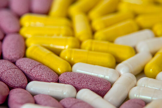 Colored tablets and capsules of food supplements
