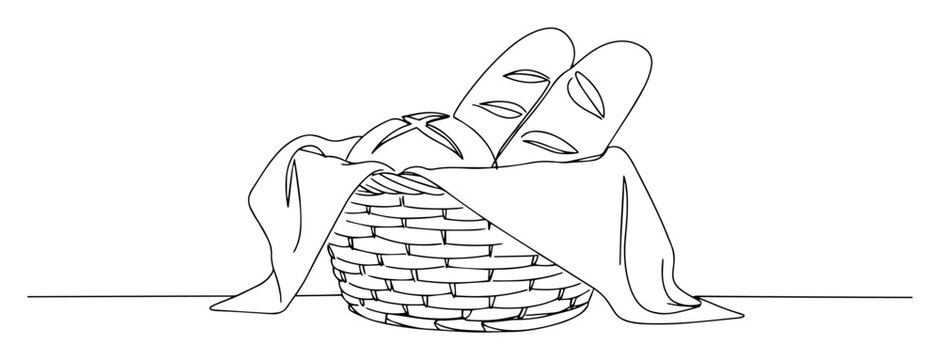 fresh bread baguettes in a wicker basket continuous one line drawing
