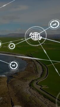 Vertical video: Aerial coastline with single HUD icon above bay, spawning globe badges mapping tech
