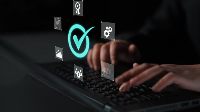 Hands typing on a laptop keyboard with glowing icons representing data analysis, business success, communication, and technology in a dark environment Gluon.