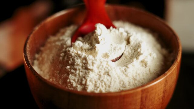 Using flour for baking bread and pastries in a kitchen setting