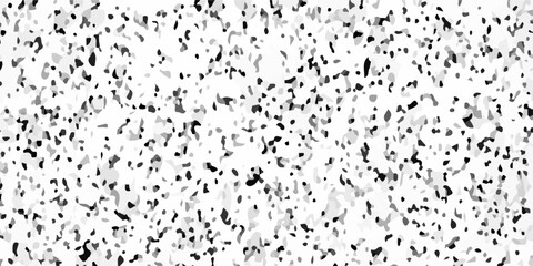 Fototapeta premium Black and white terrazzo texture seamless pattern with dark stone chips on light marble. A densely speckled abstract texture with varying shades of gray and black against a white background