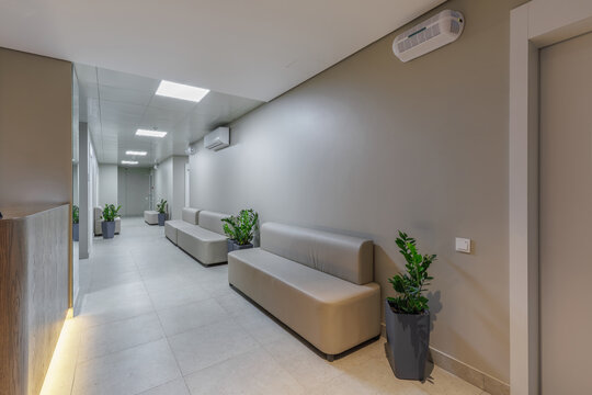 Modern Clinic Hallway with Reception and Seating