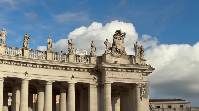 Rome, Italy Panoramic view of St. Peters Square in Vatican City. Majestic colonnades, classical statues, and open sky create a historic and iconic scene.