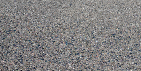 Fototapeta premium grey asphalt road surface texture with perspective for transportation background urban street pavement and construction concept material