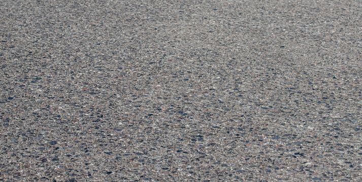 grey asphalt road surface texture with perspective for transportation background urban street pavement and construction concept material