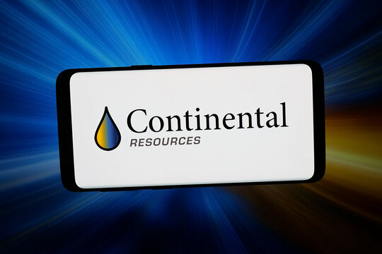 Stuttgart, Germany - 04-02-2026: In this photo illustration, the logo of petroleum company Continental Resources Inc. is displayed on a smartphone in front of abstract background on computer screen.