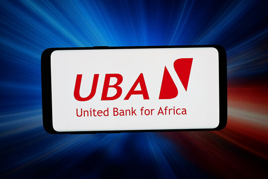 Stuttgart, Germany - 04-02-2026: In this photo illustration, the logo of company United Bank for Africa plc (UBA) is displayed on a smartphone in front of abstract background on computer screen.