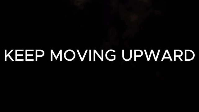 Text typography reads keep moving upward against a dark black background setting a bold motivational tone.
