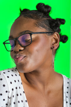 Young black woman portrait making a kissy face
