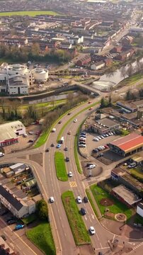 Wide 60FPS vertical social ratio aerial GV of Lisburn City Centre in Lisburn, County Antrim in the UK. Produced in 1080x1920 with Rec709 color.