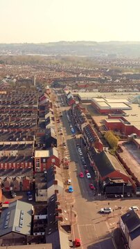 Overhead 60FPS vertical social ratio aerial GV of the Newtownards Road in East Belfast, Northern Ireland in the UK. Produced in 1080x1920 with Rec709 color.